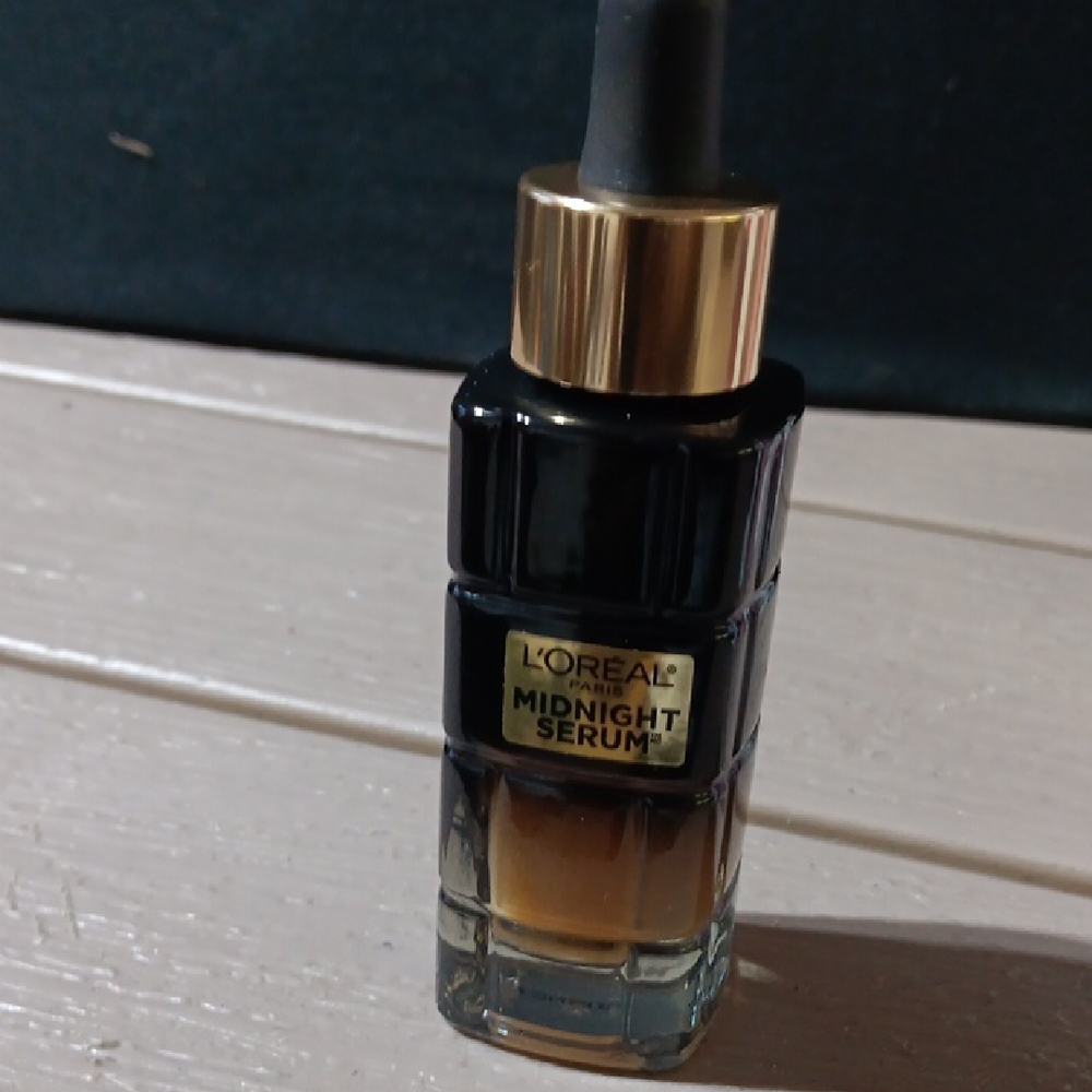 L'Oreal Midnight Serum with Black and Gold Design